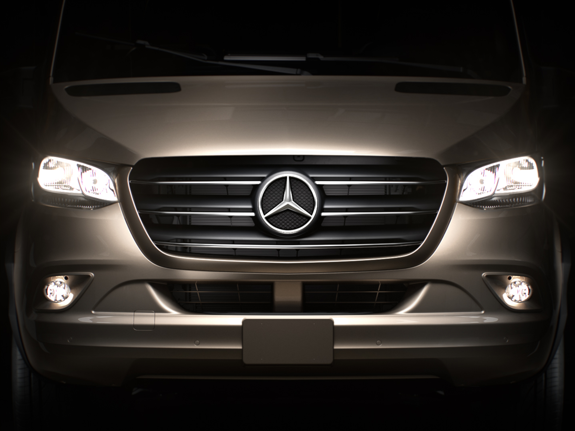 Kühlergrill eines Mercedes-Benz Sprinter.
